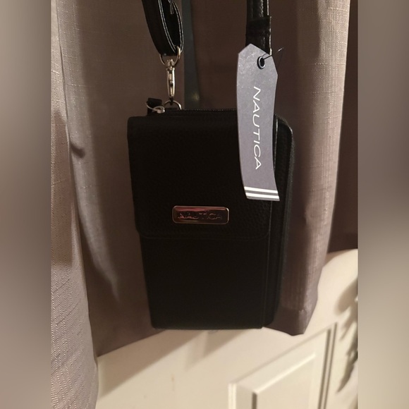 Nautica Handbags - Nautica black wallet and cell phone case with adjustable strap.